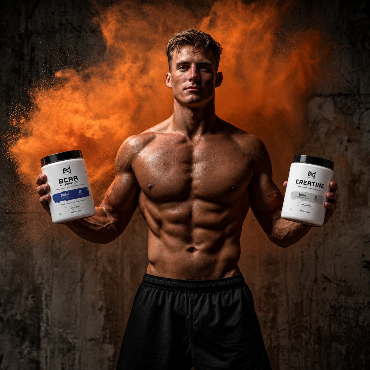Athlete holding VM Nutrition BCAA and Creatine tubs